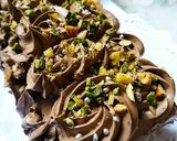 A picture of step 21 of Tahini Chocolate Cake with Coconut Chocolate Mousse frosting.