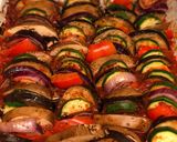 A picture of step 8 of Farm shop wild boar and venison sausages on ratatouille.