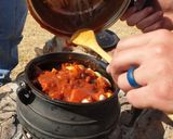 A picture of step 7 of Tomato beef potjiekos.