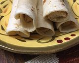 A picture of step 6 of Crockpot Chicken Taquitos Recipe.