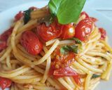 Une image de l'étape 7 de Spaghettis Tomates cerises et basilic.