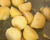 A picture of step 2 of Oven steamed Oregano Greek potatoes.