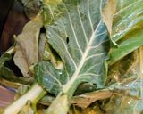 A picture of step 1 of Collard Greens; Clean, Cook, and Disposal.