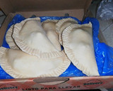 Foto del paso 5 de la receta: Empanadas fritas de queso, machas, ostiones, camarones