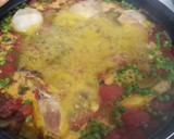 Foto del paso 10 de la receta: Paella exprés de conejo y pollo