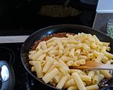 A picture of step 10 of Greek lamb pastitsio bake with rocket salad.