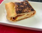 Foto del paso 4 de la receta: Stromboli (pizza rellena enrollada)