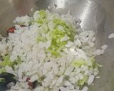 A picture of step 2 of Atukulu with coconut and cucumber in south style.