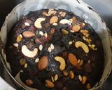 A picture of step 8 of Christmas special eggless plum cake.