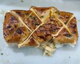 A picture of step 3 of Pull apart Garlic Bread.