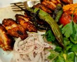 A picture of step 4 of Grill chicken with veggies.