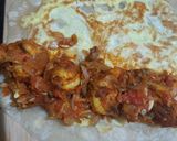 A picture of step 6 of Egg Prawn Roll in kolkata style.