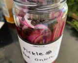 A picture of step 1 of Red Onion Pickle.
