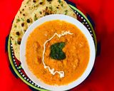 A picture of step 3 of Butter chicken 🐓 with garlic naan.