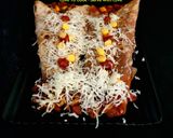 A picture of step 5 of Cheese Schezwan Pizza Frankie.