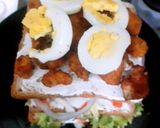 A picture of step 9 of Delicious tower sandwich.