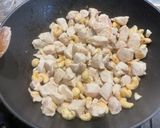 A picture of step 14 of Chicken with Cashews, Bell Peppers, and Carrots.