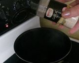 A picture of step 9 of Chicken Philadelphia Rolls .