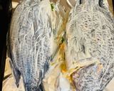 A picture of step 3 of Tilapia baked with carrots and onions.