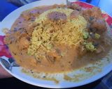 A picture of step 13 of My Hot Chicken Curry around an island of special fried rice. 😀.