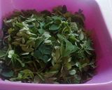 A picture of step 1 of Kwadon Zogale (moringa leaf salad).