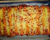 A picture of step 12 of XXXX Hot Beef Enchiladas.