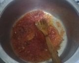 A picture of step 1 of Tumeric rice with sausages, egg curry and salad.