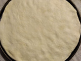 Pizza de cebolla y quesos
