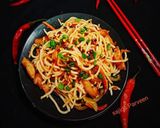 A picture of step 7 of Chicken Chow Mein.