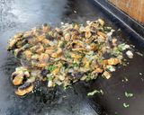 Une image de l'étape 11 de Champignons de Paris sautés à l’ail, oignon doux et coriandre fraîche.