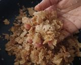 A picture of step 2 of Meethi choori(roti flakes cooked in ghee and jaggery).