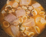 Foto del paso 4 de la receta: Merluza con calamares y patatas