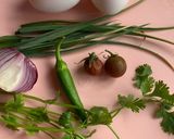 A picture of step 1 of 10 mins Hara lehsan Omelette (green garlic omelette).