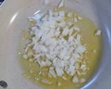 Foto del paso 3 de la receta Revuelto de quinoa con gulas y espárragos verde en conserva