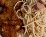 A picture of step 7 of American-Style Chicken with Red Spaghetti and Sausage.