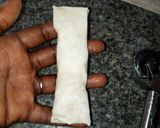 A picture of step 9 of Crunchy chicken filo cigars.