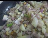 A picture of step 2 of Egg Masala Dry.
