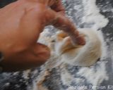 A picture of step 11 of Garlic knots.