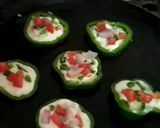 A picture of step 5 of Cheese Capsicum uttapam.