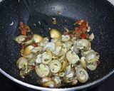 A picture of step 8 of Stuffed clams gravy.