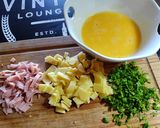 Foto del paso 2 de la receta: Omelette jamón queso cilantro 🥚🧀💚