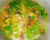 Foto langkah ke 4 dari resep Ikan Mas Kemangi Kuah Kuning.