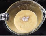 A picture of step 5 of Mango popsicles.