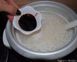 A picture of step 2 of Rice with salmon fish and vegetables.