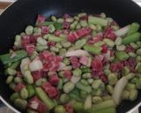 Foto del paso 2 de la receta: Revuelto de habas, jamón y ajetes