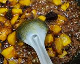 A picture of step 3 of Raw mango vaghariyu.