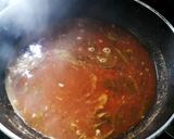 A picture of step 8 of Tomato rasam.
