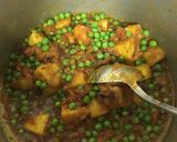 A picture of step 5 of Aloo Mater salan.