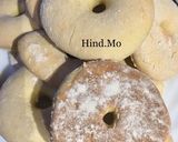 A picture of step 15 of Baked American Cake Donuts.
