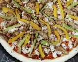 A picture of step 4 of Pizza with pineapple chunks by azmat #eid k pakwan.